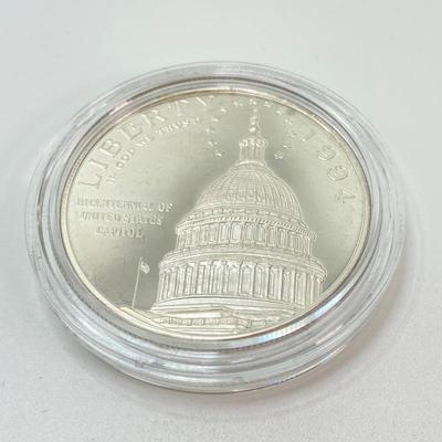 LOT 102: 1994 Bicentennial of the U.S. Capitol Commemorative Silver Dollar Proof Coin in Presentation Box and Certificate of Authenticity