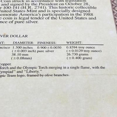 LOT 106: United States Mint 1988 Olympic Silver Dollar Proof Coin with Presentation Box and Certificate of Authenticity