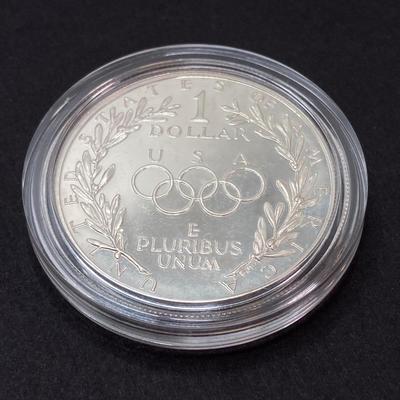 LOT 106: United States Mint 1988 Olympic Silver Dollar Proof Coin with Presentation Box and Certificate of Authenticity