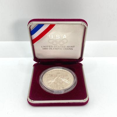 LOT 106: United States Mint 1988 Olympic Silver Dollar Proof Coin with Presentation Box and Certificate of Authenticity