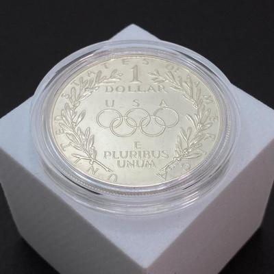 LOT 106: United States Mint 1988 Olympic Silver Dollar Proof Coin with Presentation Box and Certificate of Authenticity