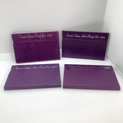 LOT 108: Four United States Mint Proof Coin Sets - 1987, (2) 1988 and 1990