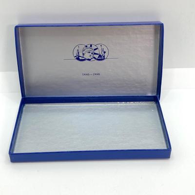 LOT 110: Pair of 1986 United States Liberty Coin Sets with Silver Dollar Coins in Presentation Boxes with Certificate of Authenticity