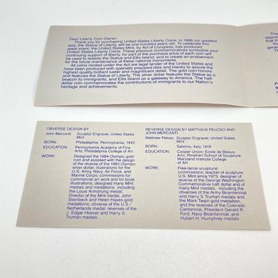 LOT 110: Pair of 1986 United States Liberty Coin Sets with Silver Dollar Coins in Presentation Boxes with Certificate of Authenticity