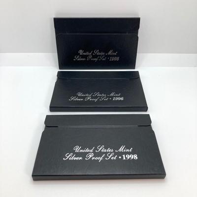 LOT 113: Three United States Mint Silver Proof Coin Sets - 1995, 1996 and 1998