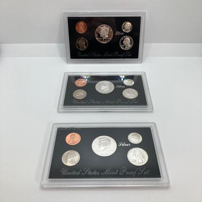 LOT 113: Three United States Mint Silver Proof Coin Sets - 1995, 1996 and 1998