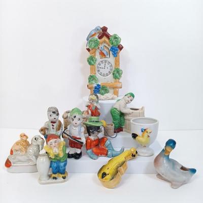 LOT 123: Vintage Japan Porcelain - Cuckoo Clock Wall Pocket, Puss in Boots, Clown Toothpick Holder & More