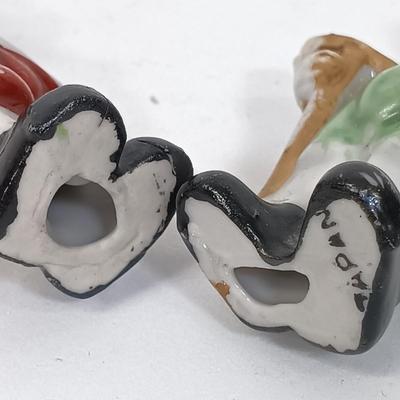 LOT 123: Vintage Japan Porcelain - Cuckoo Clock Wall Pocket, Puss in Boots, Clown Toothpick Holder & More