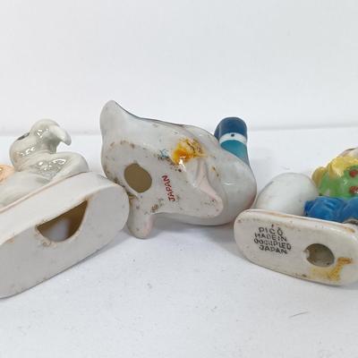 LOT 123: Vintage Japan Porcelain - Cuckoo Clock Wall Pocket, Puss in Boots, Clown Toothpick Holder & More