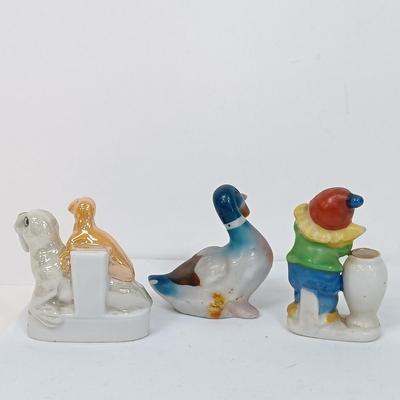 LOT 123: Vintage Japan Porcelain - Cuckoo Clock Wall Pocket, Puss in Boots, Clown Toothpick Holder & More