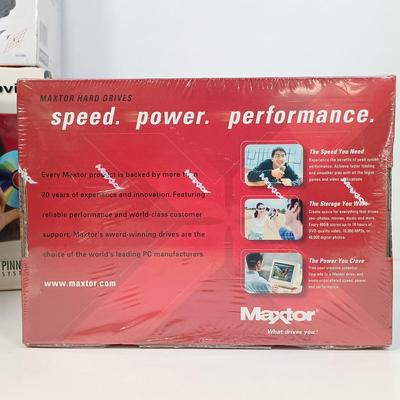LOT 124: New/Old Stock - Maxtor 200GB Hard Drive, HDTV Hook-Up Kit, PC Analog Joystick & More