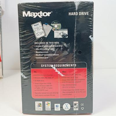 LOT 124: New/Old Stock - Maxtor 200GB Hard Drive, HDTV Hook-Up Kit, PC Analog Joystick & More