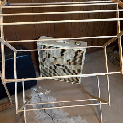 Two clothing, racks, plan, and Samsonite suitcase