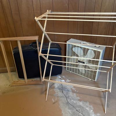 Two clothing, racks, plan, and Samsonite suitcase