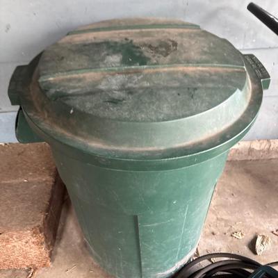 Trash can with hoses & sprinklers