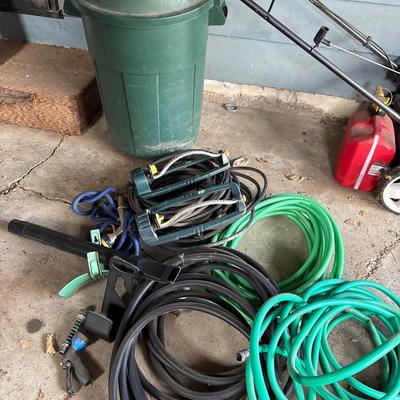 Trash can with hoses & sprinklers