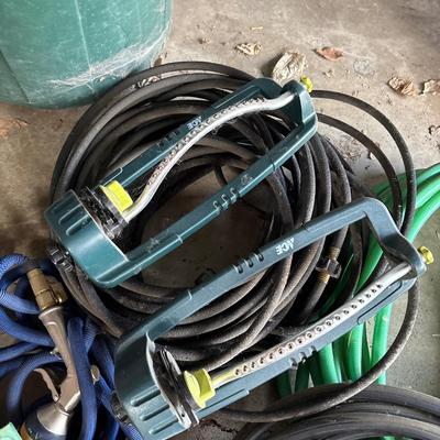 Trash can with hoses & sprinklers