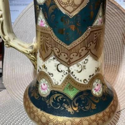 Antique Victorian Era Decorated Tankard/Pitcher Unmarked Base 13.5" Tall in Good Preowned Condition.