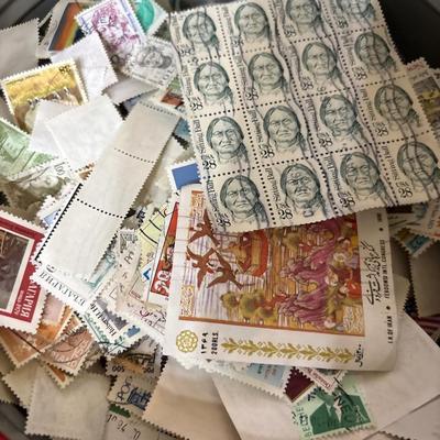 Tin of used stamps & some new stamps