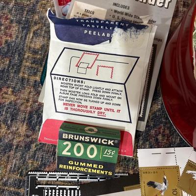 Tin of used stamps & some new stamps