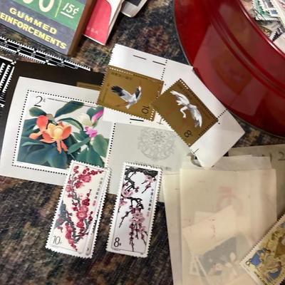 Tin of used stamps & some new stamps