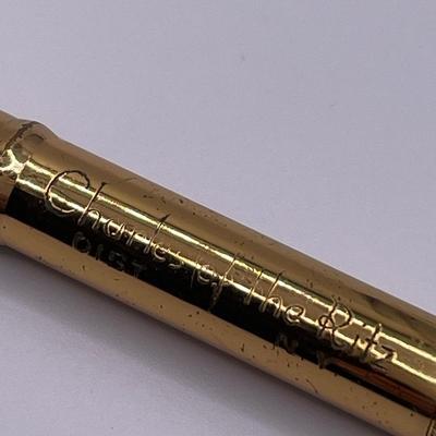 Watch, charcoal pencil and 1/20 12k gold bracelet