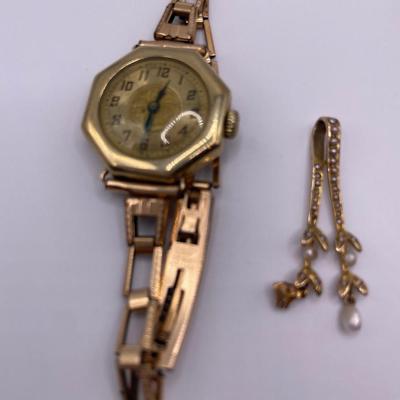 Watch, charcoal pencil and 1/20 12k gold bracelet