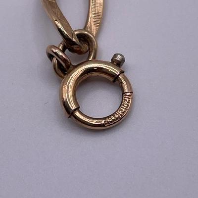 Watch, charcoal pencil and 1/20 12k gold bracelet