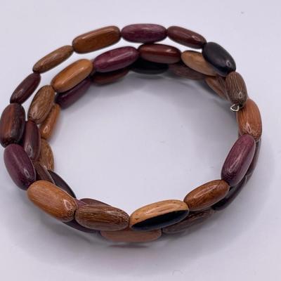 Pocket knives, wood bracelet and pins