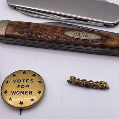 Pocket knives, wood bracelet and pins