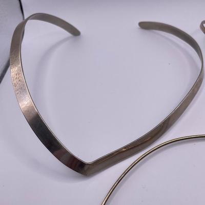 V shaped necklaces and one round