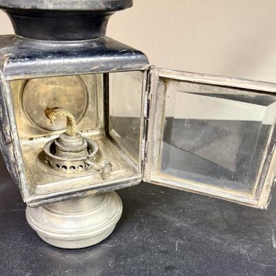 Sale Photo Thumbnail #656: A nice old kerosene automobile or carriage buggy lamp. Model 143, manufactured by C.M. Hall Co, out of Detroit, Mich U.S.A., per etchings on top. This company dissolved in 1926 so this item is definitely from the early 1900s era.