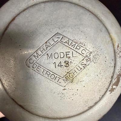 Sale Photo Thumbnail #658: A nice old kerosene automobile or carriage buggy lamp. Model 143, manufactured by C.M. Hall Co, out of Detroit, Mich U.S.A., per etchings on top. This company dissolved in 1926 so this item is definitely from the early 1900s era.