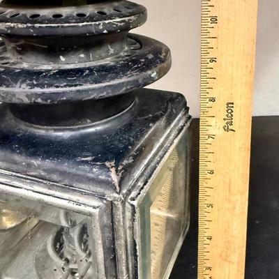 Sale Photo Thumbnail #659: A nice old kerosene automobile or carriage buggy lamp. Model 143, manufactured by C.M. Hall Co, out of Detroit, Mich U.S.A., per etchings on top. This company dissolved in 1926 so this item is definitely from the early 1900s era.