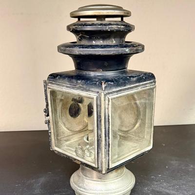 Sale Photo Thumbnail #663: A nice old kerosene automobile or carriage buggy lamp. Model 143, manufactured by C.M. Hall Co, out of Detroit, Mich U.S.A., per etchings on top. This company dissolved in 1926 so this item is definitely from the early 1900s era.