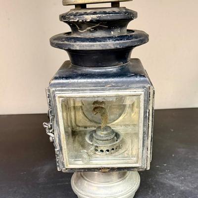 Sale Photo Thumbnail #655: A nice old kerosene automobile or carriage buggy lamp. Model 143, manufactured by C.M. Hall Co, out of Detroit, Mich U.S.A., per etchings on top. This company dissolved in 1926 so this item is definitely from the early 1900s era.