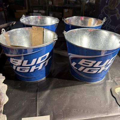 72-Metal bar signs and buckets