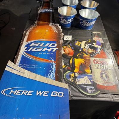 72-Metal bar signs and buckets