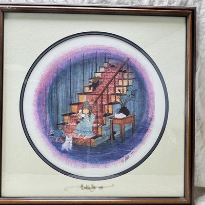 Sale Photo Thumbnail #350: 1988 The item is a framed limited edition print titled "I Love You Grandma" by artist P. Buckley Moss. 
It is a limited edition piece, often hand-signed and numbered by the artist. 
The image depicts a young girl on a staircase with cats. 20 X 20"