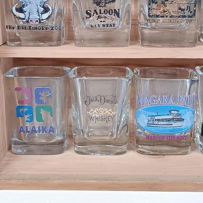 LOT 126: 18-Piece Shot Glass Display Case with NIP Wine Glass, Puzzle & Drink Cozy