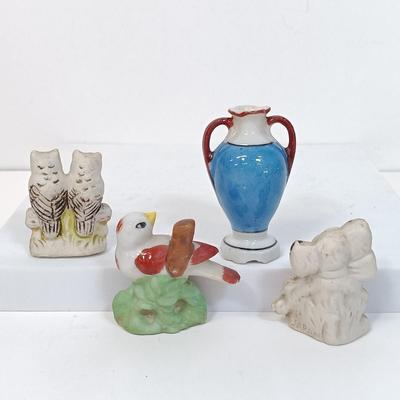 LOT 127: Set of (25) Japan Porcelain Miniature Figurines