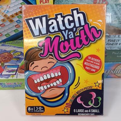 LOT 129: NIP Games - Trivial Pursuit DVD Pop Culture, PictureMate! 2nd Edition, Words with Friends & More