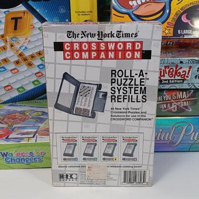 LOT 129: NIP Games - Trivial Pursuit DVD Pop Culture, PictureMate! 2nd Edition, Words with Friends & More