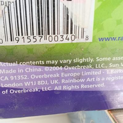 LOT 129: NIP Games - Trivial Pursuit DVD Pop Culture, PictureMate! 2nd Edition, Words with Friends & More