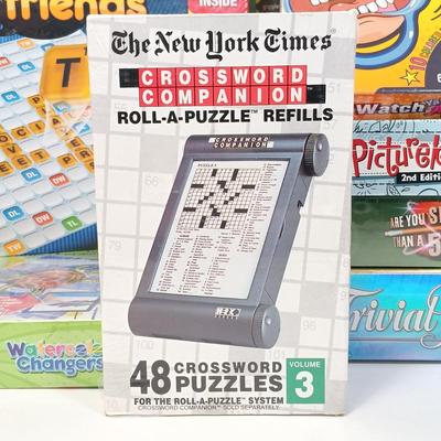 LOT 129: NIP Games - Trivial Pursuit DVD Pop Culture, PictureMate! 2nd Edition, Words with Friends & More