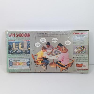 LOT 130: Vintage Games & More - 1987 It's Only Money Game, 1971 Sleuth, Sears Microscope & More