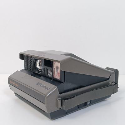 LOT 131: Polaroid Spectra System Camera, Hitachi TRQ-290 Cassette Recorder, NIP Cassettes & More