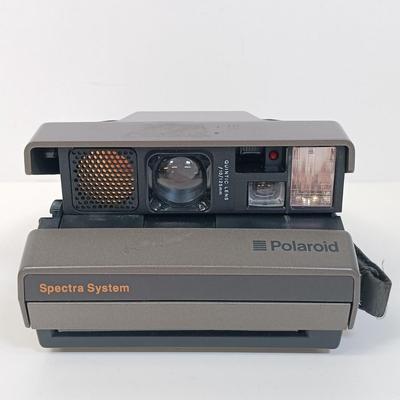 LOT 131: Polaroid Spectra System Camera, Hitachi TRQ-290 Cassette Recorder, NIP Cassettes & More