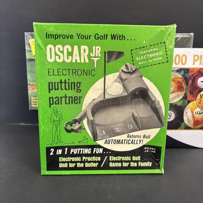 LOT 137: Golf Themed Collection: Xbox 360 Game, Vintage Oscar Jr Putting Partner, Golf Scrabble along with Billiards & Sportsman...