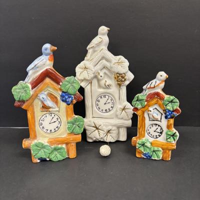 LOT 143: Vintage Hand-Painted Landscape Wall Pockets along with Vintage Cuckoo Clock Wall Pockets